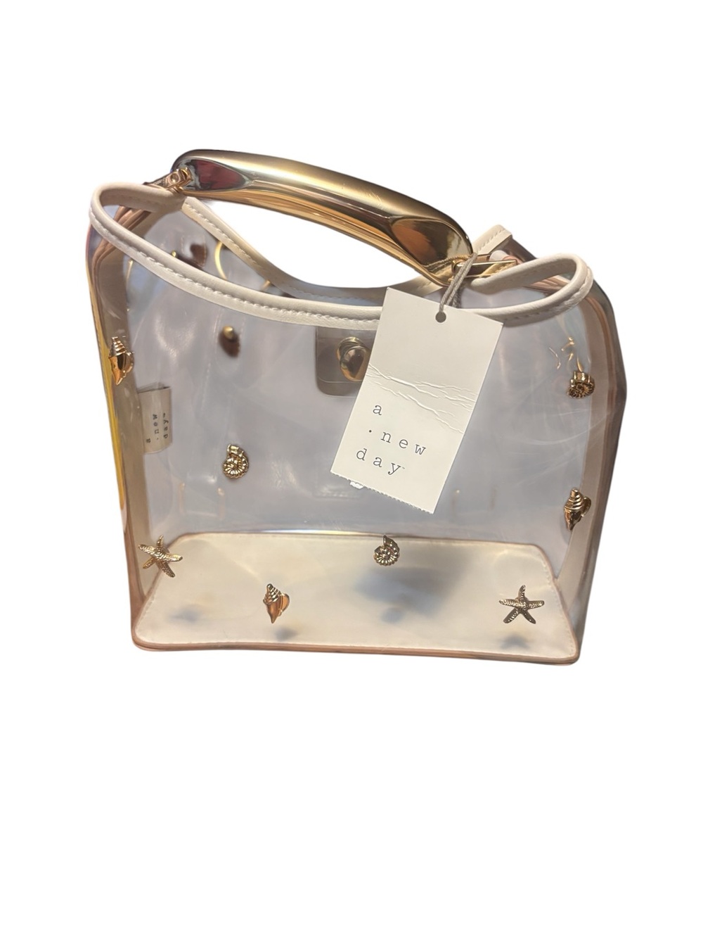 a new day Clear Tote with Gold Shell Accents and Cream Trim